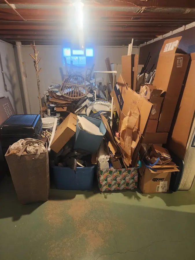 Roll-off dumpster container at job site for 6 Yard Dumpster Rental in Elsmere